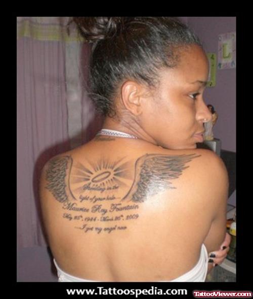 Script and Angel Wings Tattoos On Upperback