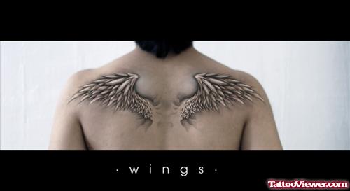 Best Grey Ink Wings Tattoos On Upperback