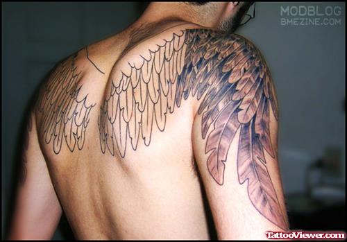 Awesome Grey Ink Wings Tattoos On Upperback