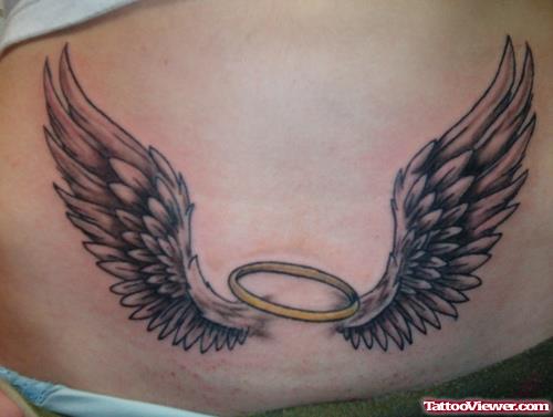 Grey Ink Wings Tattoo On Belly