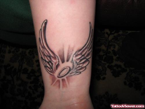 Awful Angel Wings Tattoos On Wrist