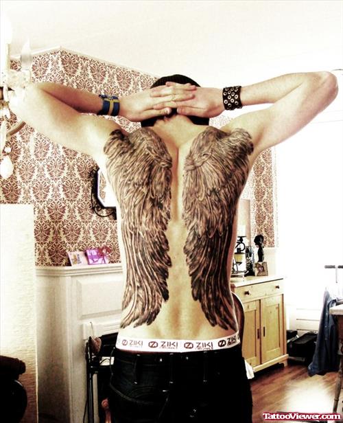 Man With Large Wings Tattoos On Back