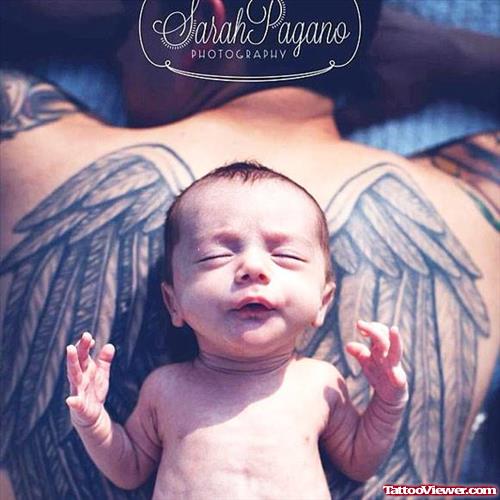 Baby and Wings Tattoos On Back