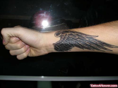 Wings Tattoo On Right Forearm