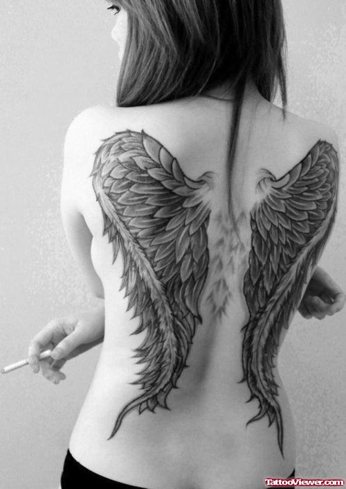 Superior Dark Ink Wings Tattoos On Back