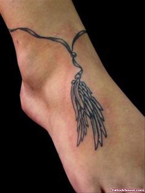Wonderful Wing Rosary Tattoo On Ankle