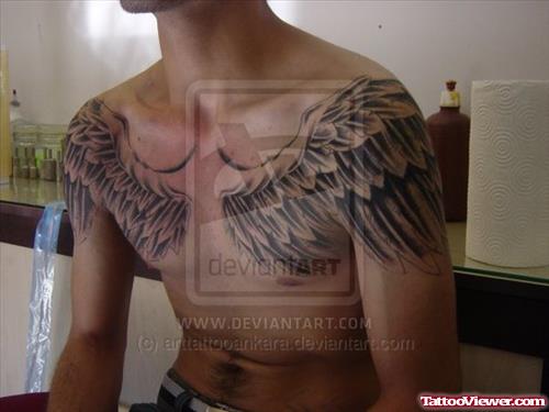 Wings Tattoos On Man Chest
