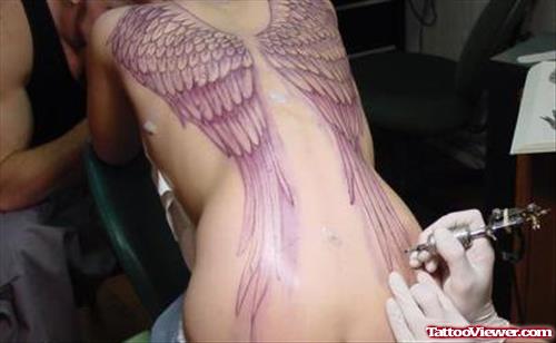 Wings Tattoos On Girl Back