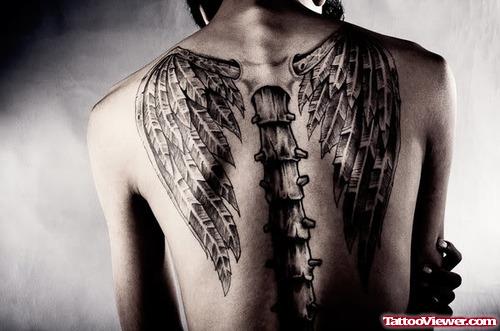 Awesome Grey Ink Wings Tattoos On Back Body