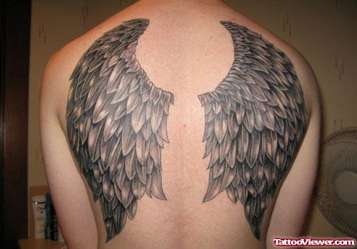 Amazing Grey Ink Wings Tattoos on Back Body