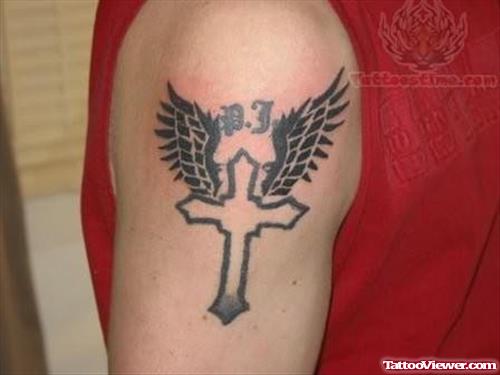 Wings And Cross Tattoo On Shoulder