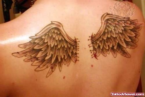 Upper Back Wings Tattoo