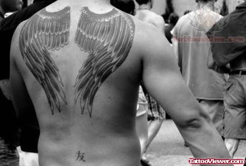 Tattoo of Wings On Upper Back