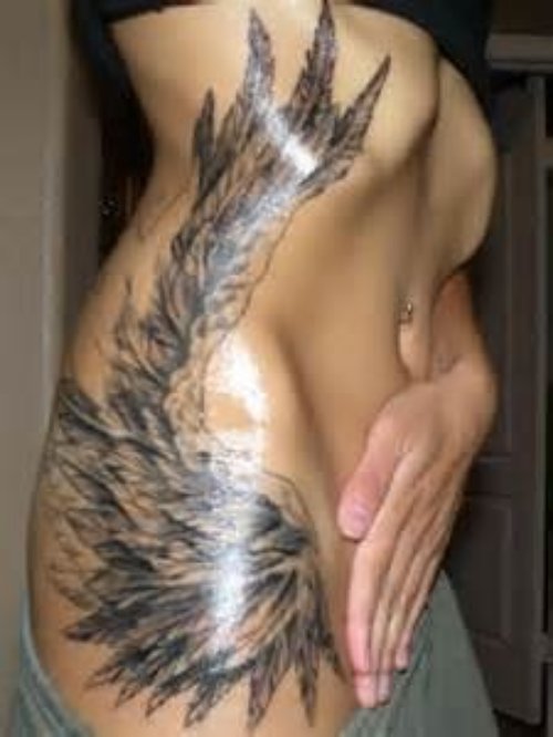 Grey Ink Angel Wings Tattoo On Girl Side Rib