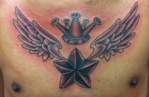 Nautical Star And Wings Tattoos On Man Chest