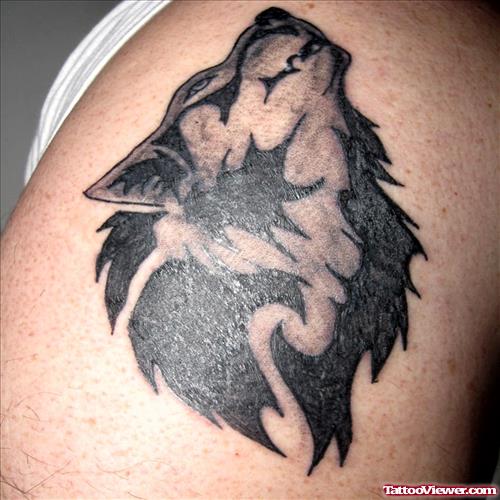 Black Ink Tribal Wolf Head Tattoo