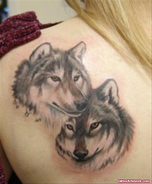 Grey Ink Wolf Heads Tattoos On Back Shoulder