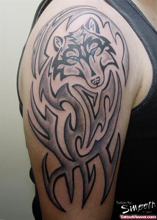 Grey Ink Tribal Wolf Tattoo On Right Half Sleeve
