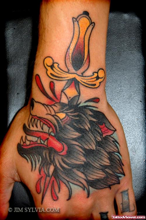 Dagger Wolf Head Tattoo On Hand