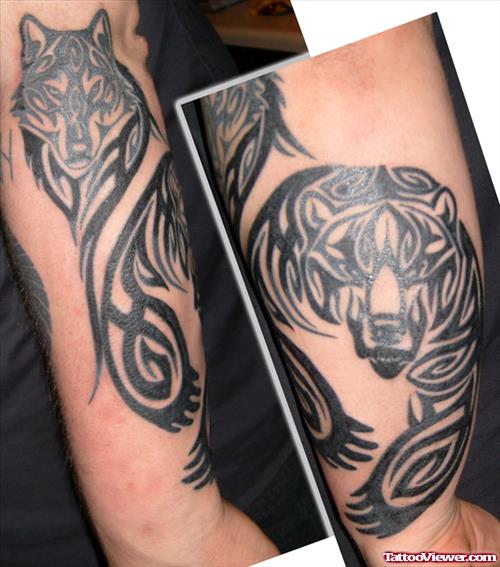 Awesome Black Tribal Wolf Tattoo On Sleeve