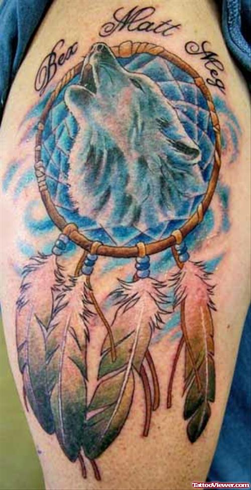 Dreamcathcer And Wolf Tattoo On Leg