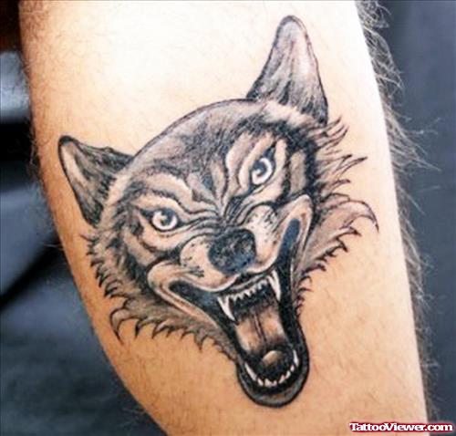 Grey Ink Crying Wolf Tattoo Design