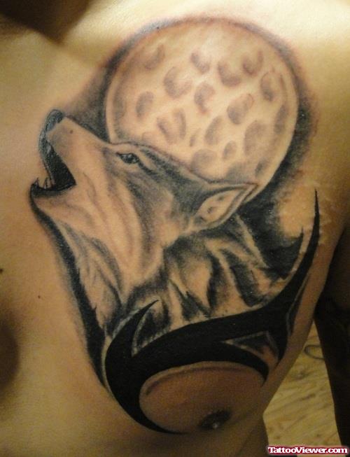 Tribal And Wolf Head Tattoo On Man Chest