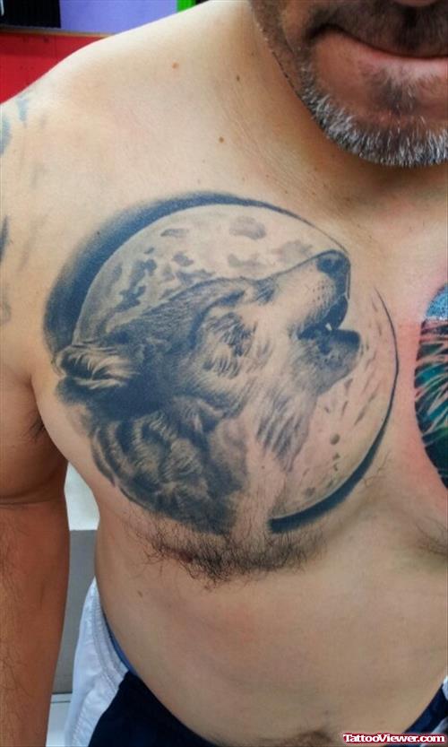 Grey Ink Moon And Howling Wolf Tattoo On Man Chest
