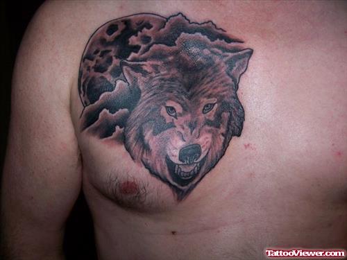 Grey Ink Clouds And Wolf Tattoo On Man Chest
