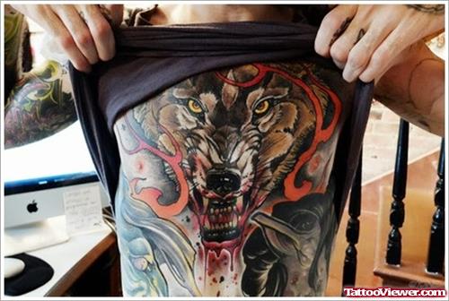 Guy Showing His Wolf Tattoo On Chest