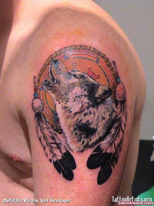 Feathers And Wolf Head Tattoo On Left Shoulder