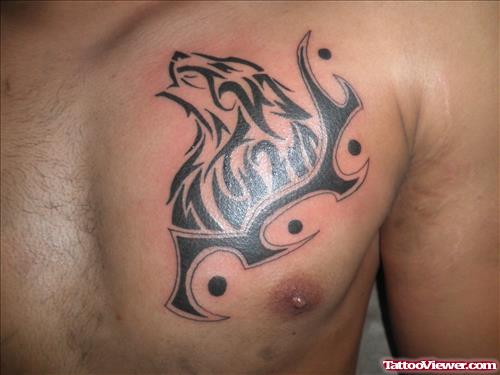 Black Ink Tribal Wolf Head Tattoo On Chest