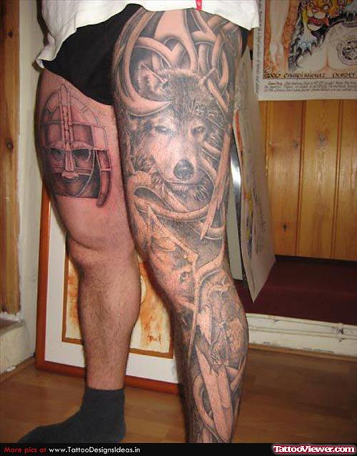 Grey Ink Tribal And Wolf Tattoo On Left Sleeve