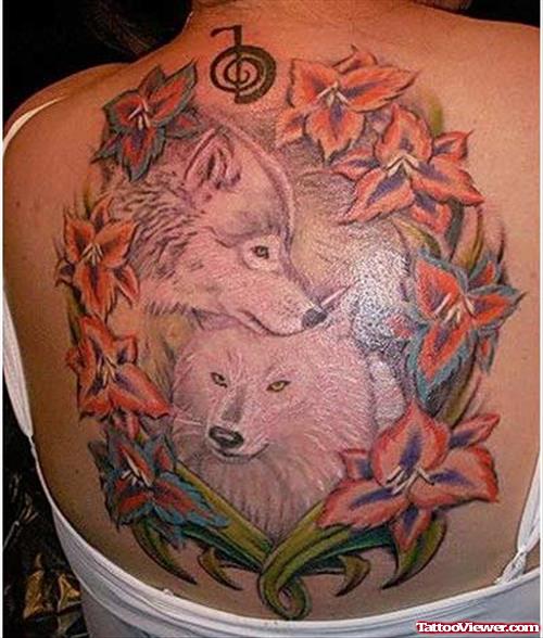 Colored Flowers And Wolf Tattoos On BAck