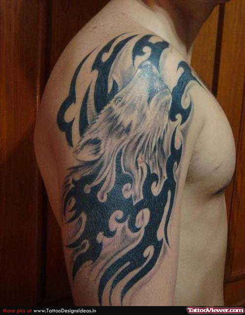 Tribal And Wolf Tattoo On Right Half Sleeve