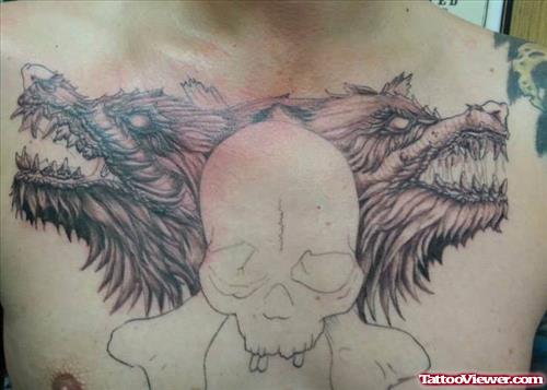 Outline Skull and Wild Wolf Head Tattoos On Man Chest