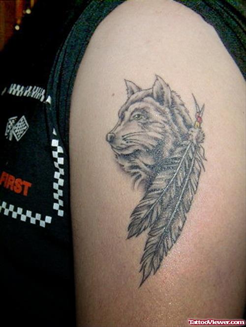 Grey Ink Feathers and Wolf Head Tattoo On Shoulder