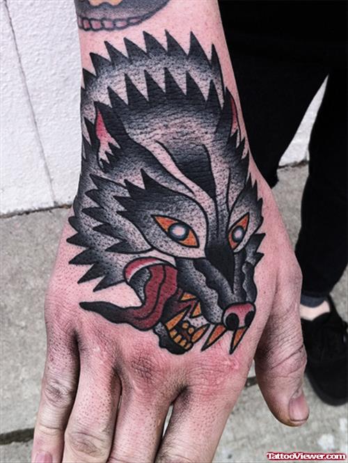 Grey Ink Wolf Head Tattoo On Right Hand