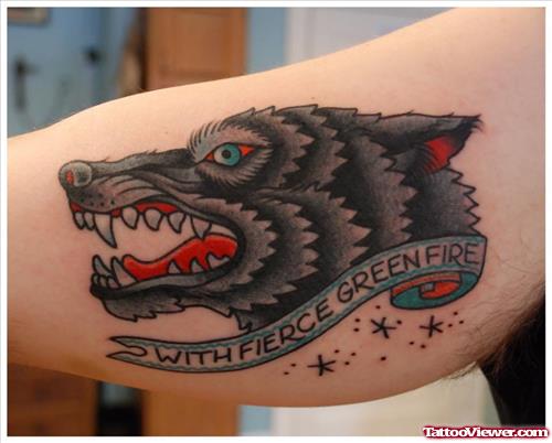 Grey Ink Wolf Head Tattoo on Bicep