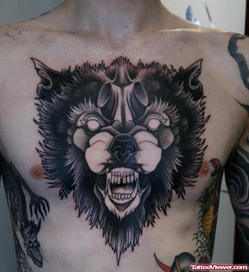 Awesome Dark Ink Wolf Head Tattoo On Man Chest
