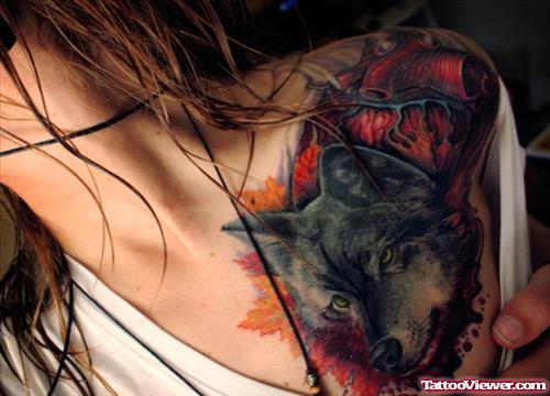 Girl Showing Her Colored Wolf Tattoo On Chest