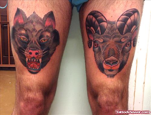Colored Wolf Heads Tattoos On Thigh