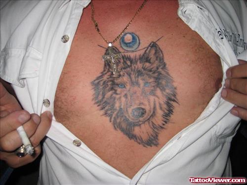 Superior Grey Ink Wolf Head Tattoo On Man Chest