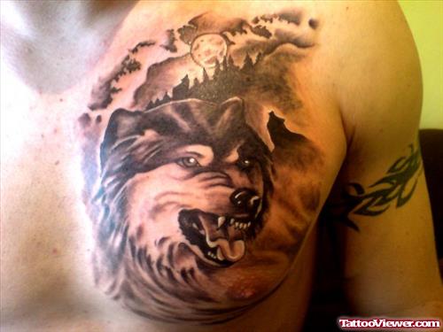 Simple Grey Ink Wolf Head Tattoo On Man Chest