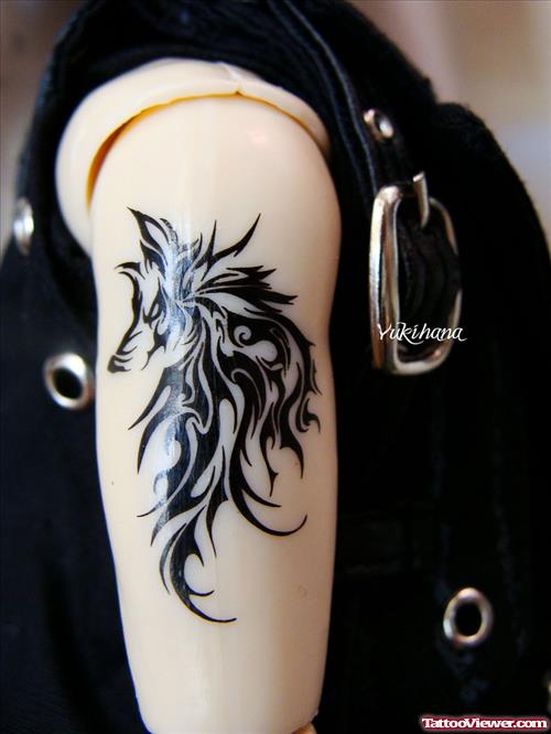 Tribal Wolf Tattoo On Bicep