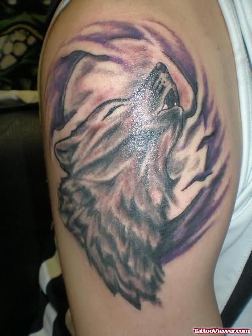 Wolf Haunting Tattoo On Bicep
