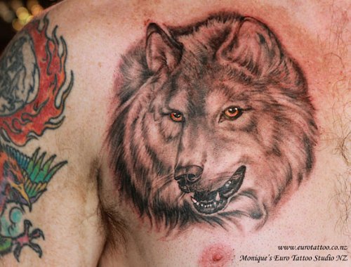 Nice Grey Ink Wolf Tattoo On Chest
