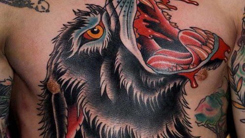Awesome Colored Ink Wolf Tattoo On Man Chest