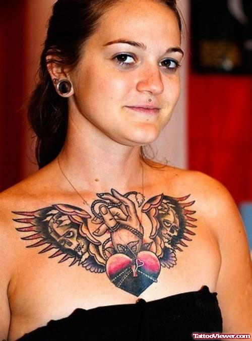 Skull Wings And Heat Women Tattoo On Chest