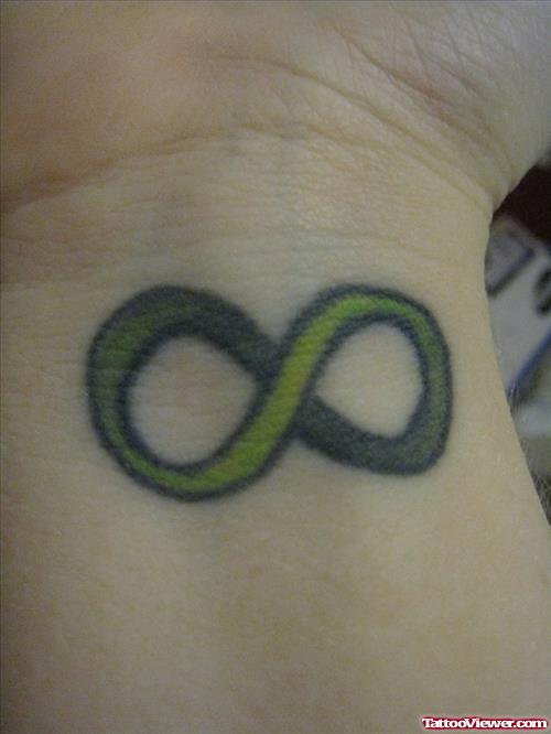 Green Ink Infinity Symbol Women Tattoo On Wrist